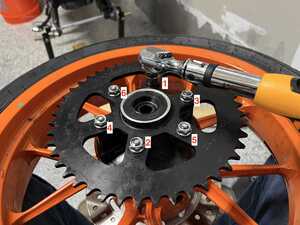 Rear sprocket being torqued down to spec